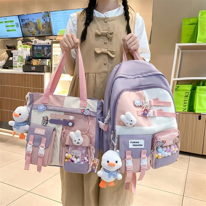 书包女生小学生三到六年级少女中学生初中生大容量撞色儿童双肩包