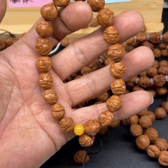 龙纹桃核财神手串