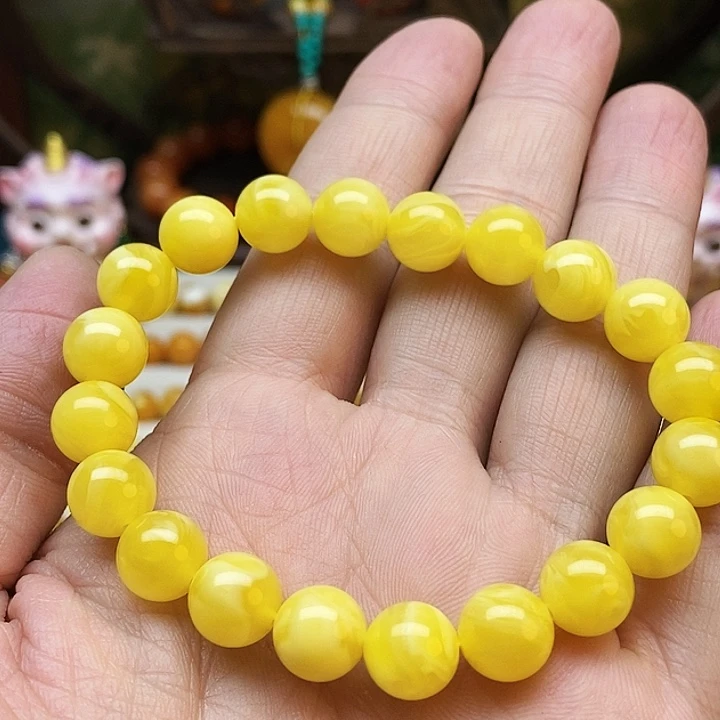 赵***7非金属鸡油黄色一套搭配