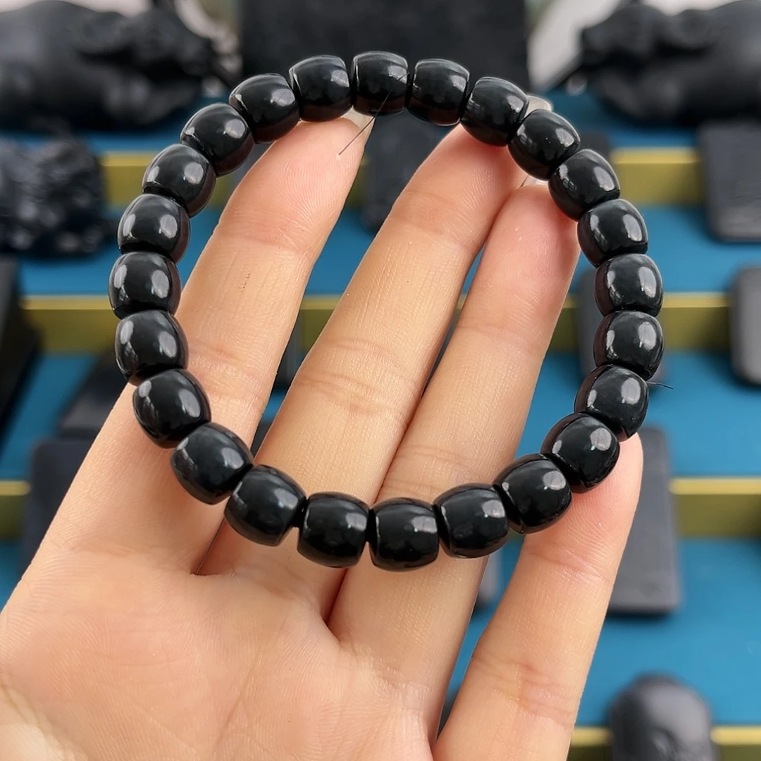 和田玉（墨玉）卡9mm直切羊脂级未镶嵌