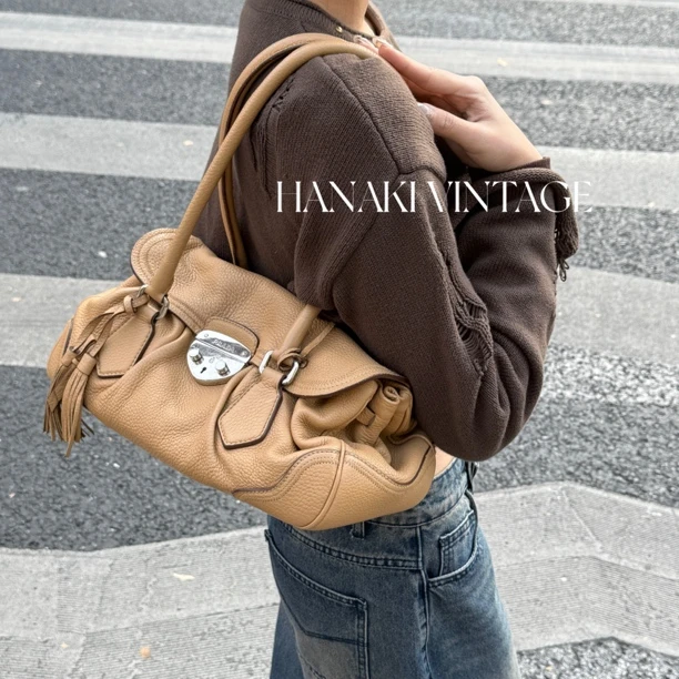 95新 Prada/普拉达 花绮中古/Prada奶茶色全皮猪鼻子单肩包/95新