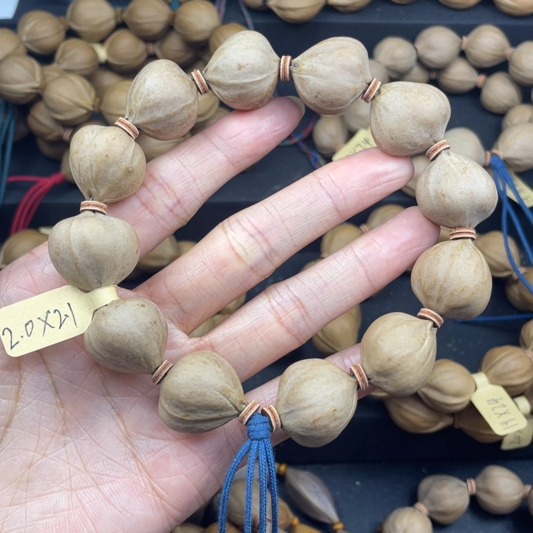 我***我001橄榄核三花蒜头20*21