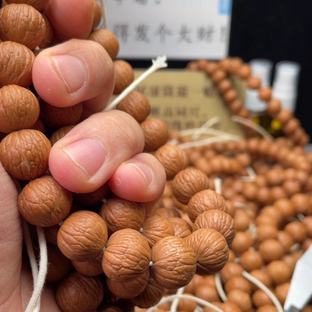 猴头核桃吊坠凤羽手持