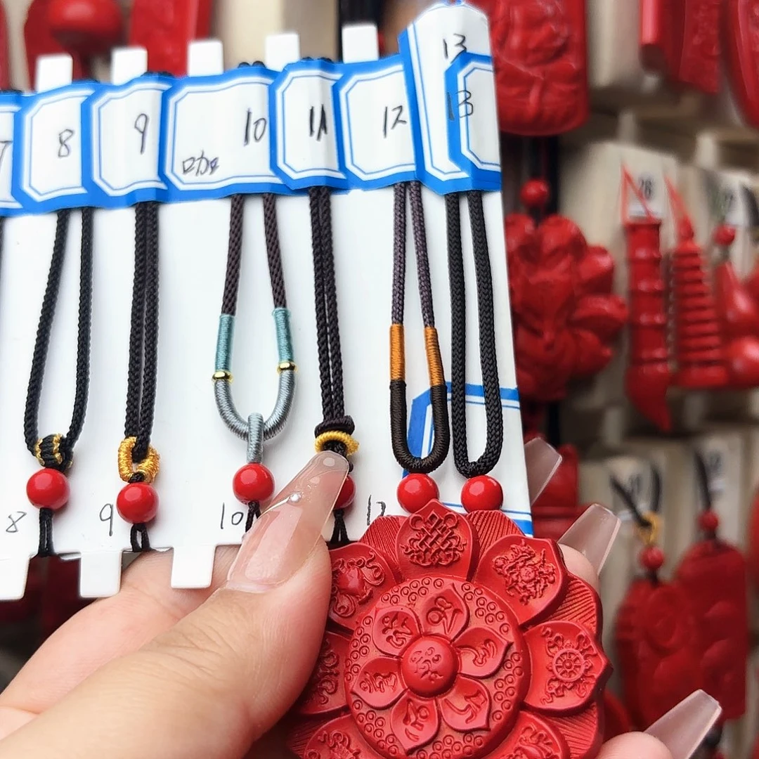 敏***天然辰砂红砂吊坠