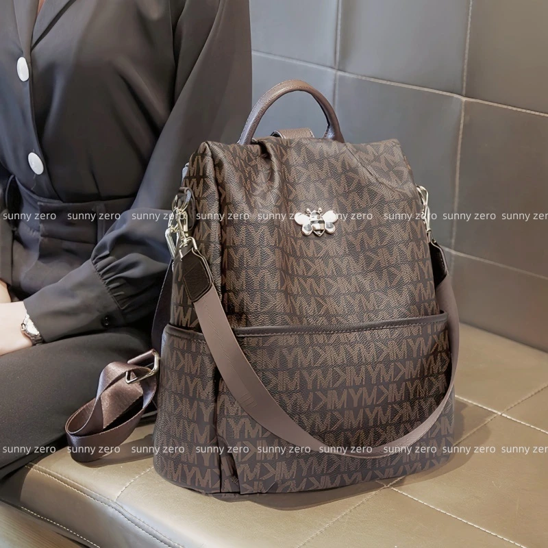 法式真皮字母印花双肩包女时尚设计感小众大容量防盗软皮旅行包潮