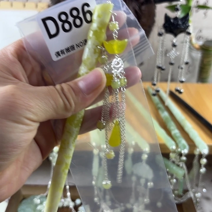 蛇纹石玉发饰合金王**贝