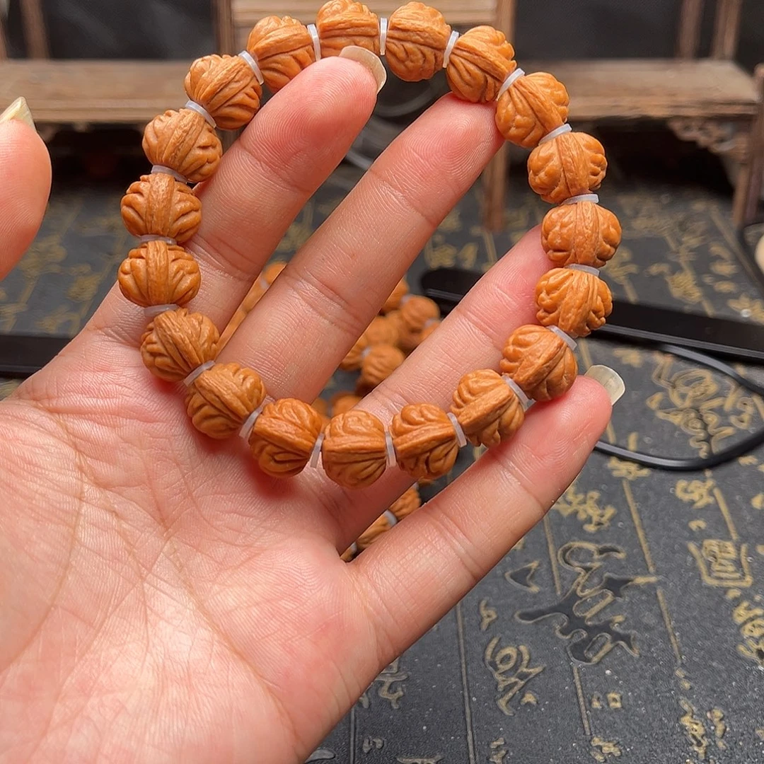 桃核吊坠小金豆手串