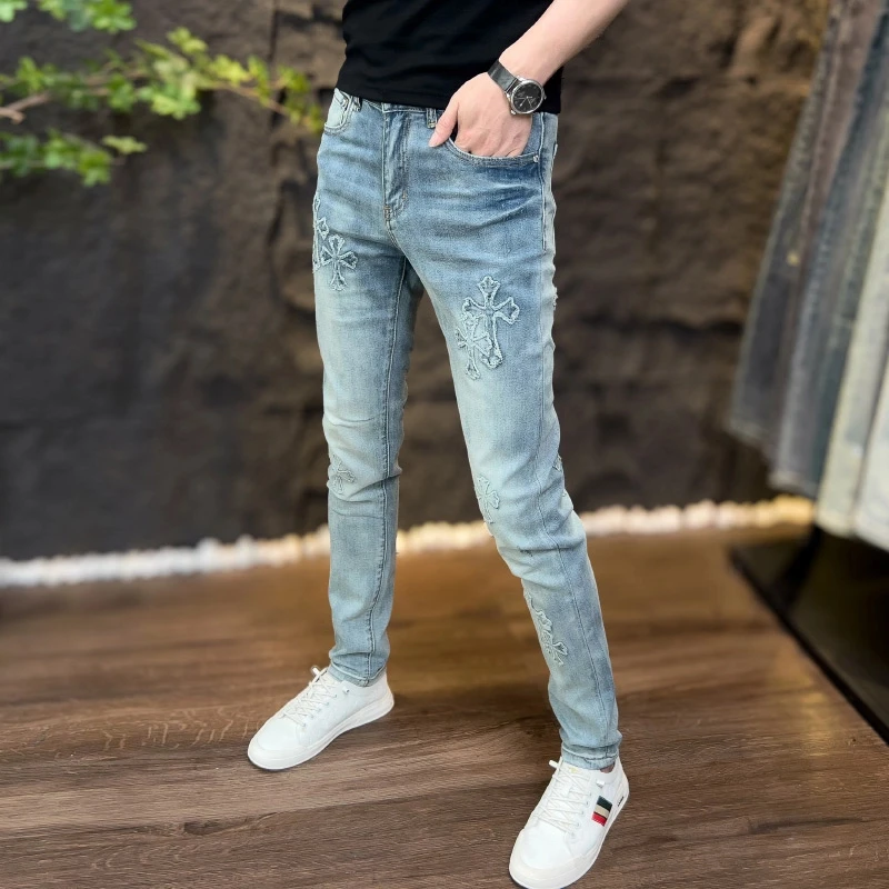 春秋薄款欧版男士潮流牛仔裤复古补丁水洗百搭修身弹力小脚长裤子