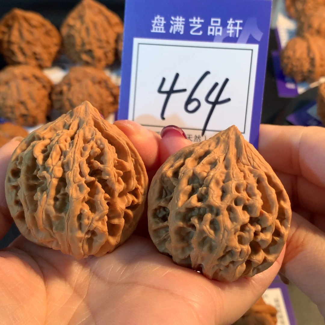 苏***楼文玩核桃把件464九龙筋三棱4.2