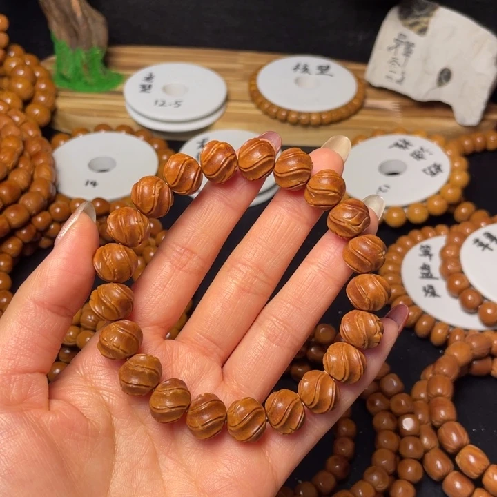 吐***钱桃核手串龙纹桃核雕刻款手串