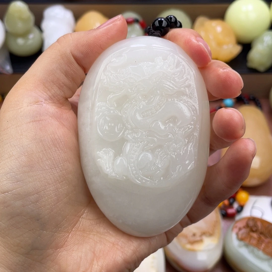 仰***宇石材天然古石手把件