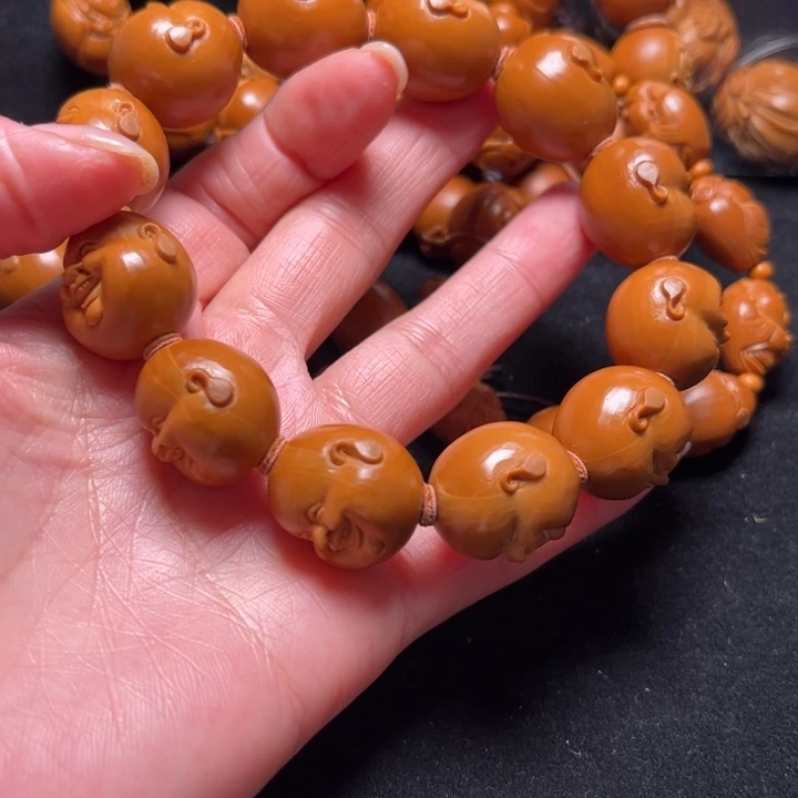 栋***吊坠橄榄核开心19