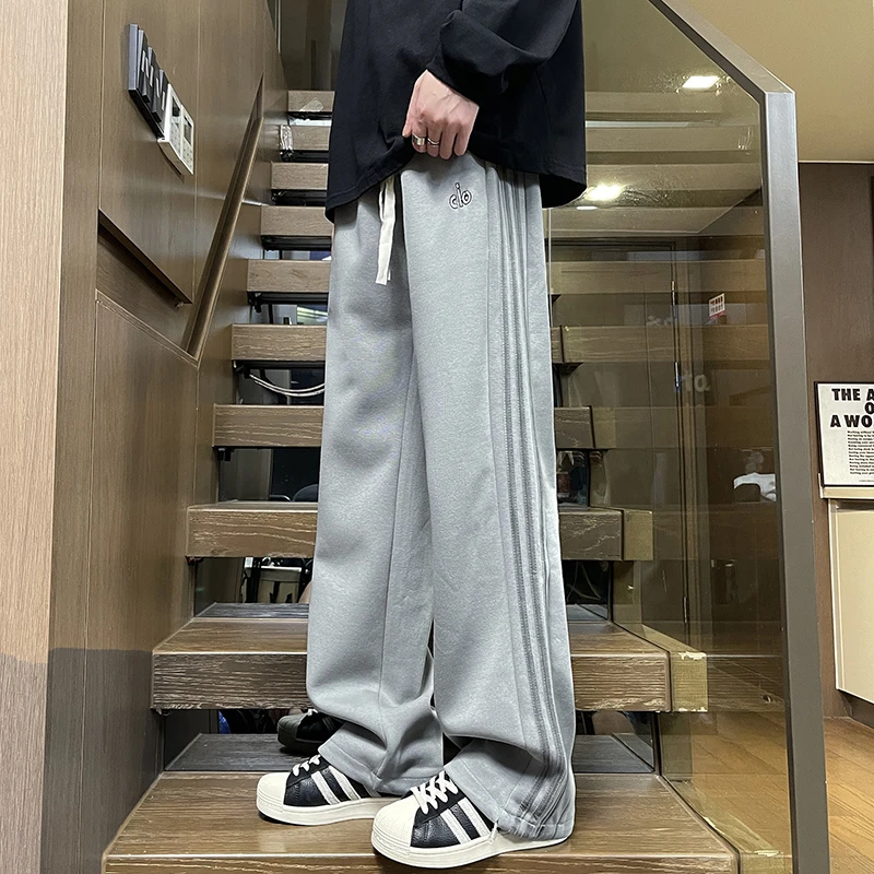 青少年学生春秋新款休闲直筒卫裤宽束两用时尚宽松百搭抽绳休闲裤