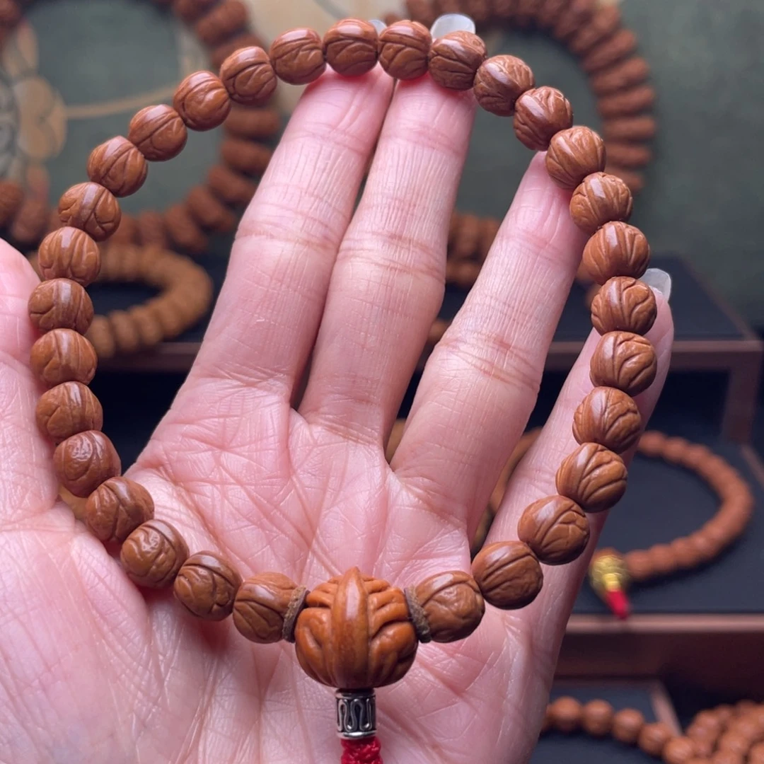 桃核手串0.9玉龙脊