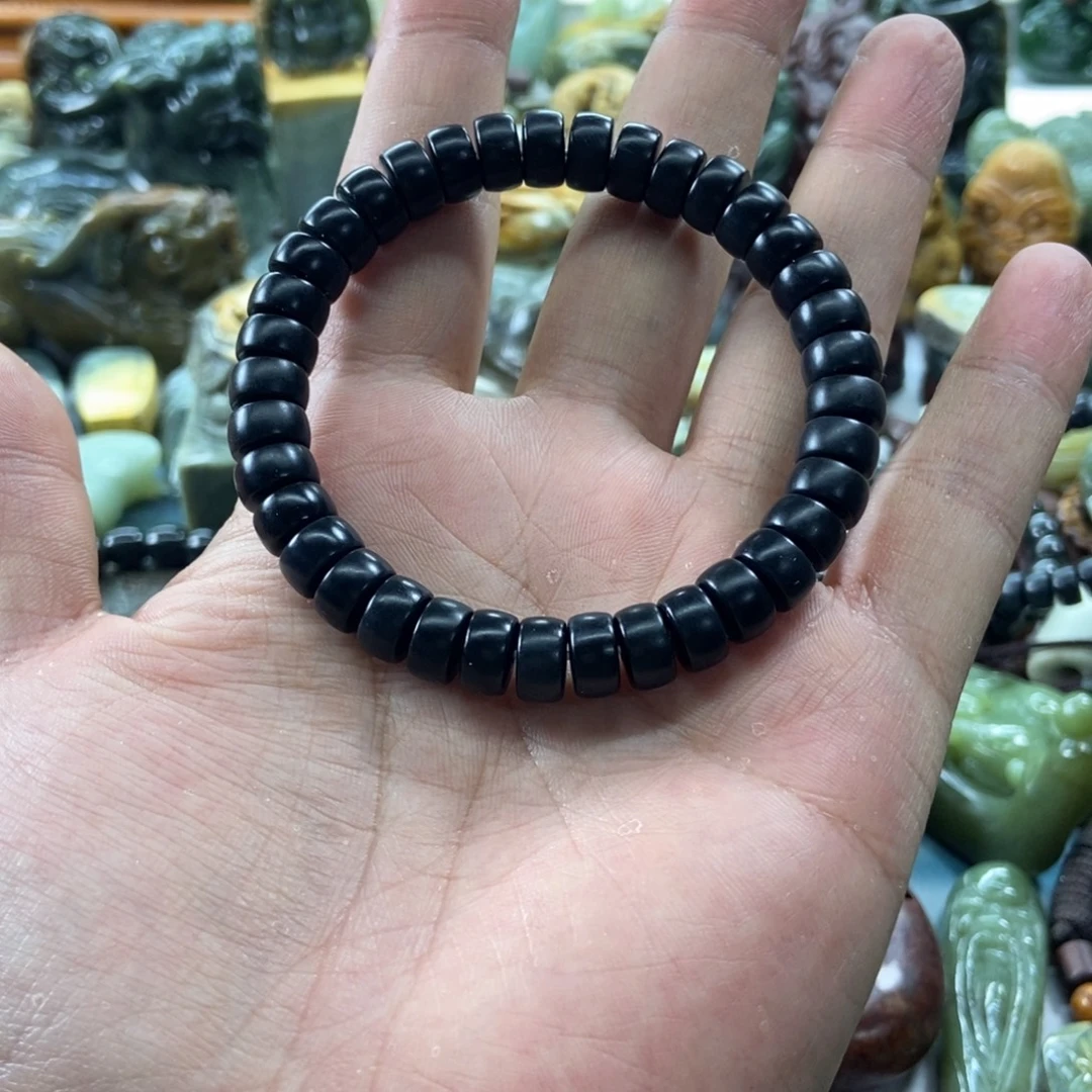 独***雪未镶嵌和田玉（墨玉）把件