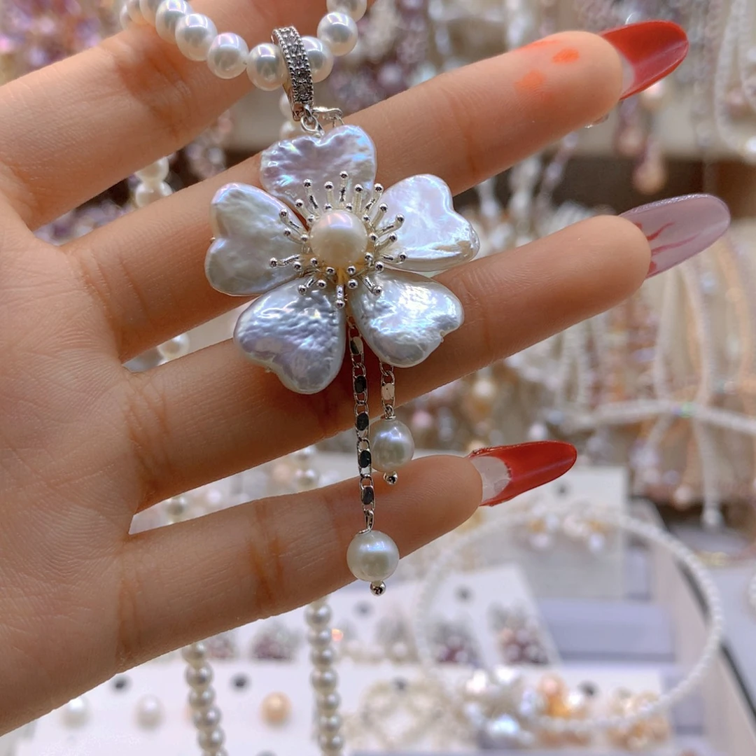 淡水珍珠耳饰银S925镶嵌A***朵