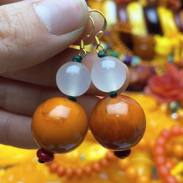 树脂制品100号橘色耳坠