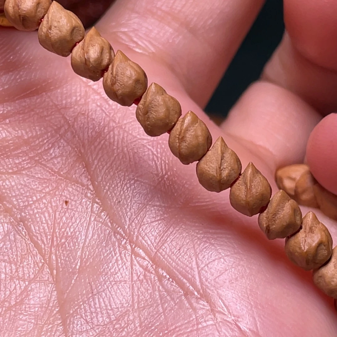 柏香籽/百香籽吊坠报喜鸟