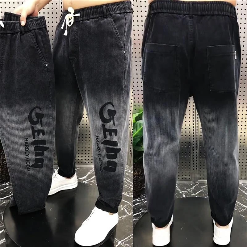 秋冬新款黑色渐变宽松牛仔裤男弹力休闲小脚裤子松紧腰百搭哈伦裤
