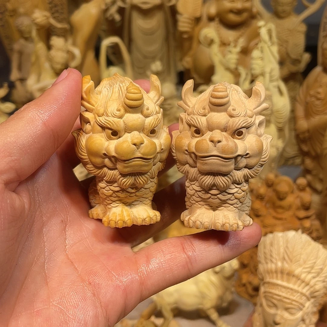 黄杨木小瑕疵麒麟一对