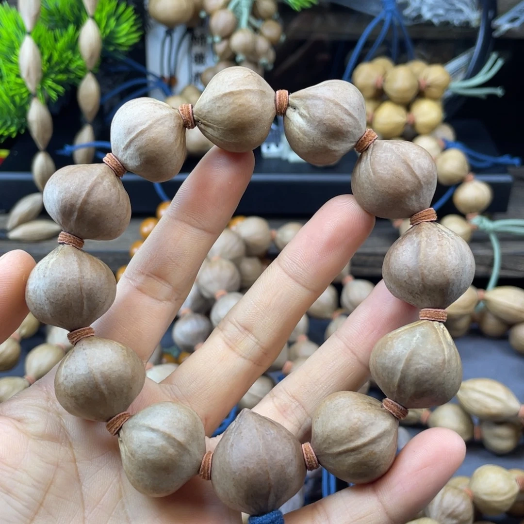 孟****吊坠橄榄核001.23x24