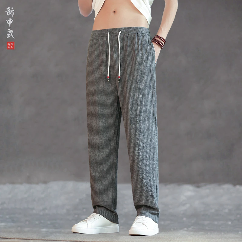 新中式夏季薄款褶皱冰丝休闲裤微弹透气大码直筒裤简约大气哈伦裤