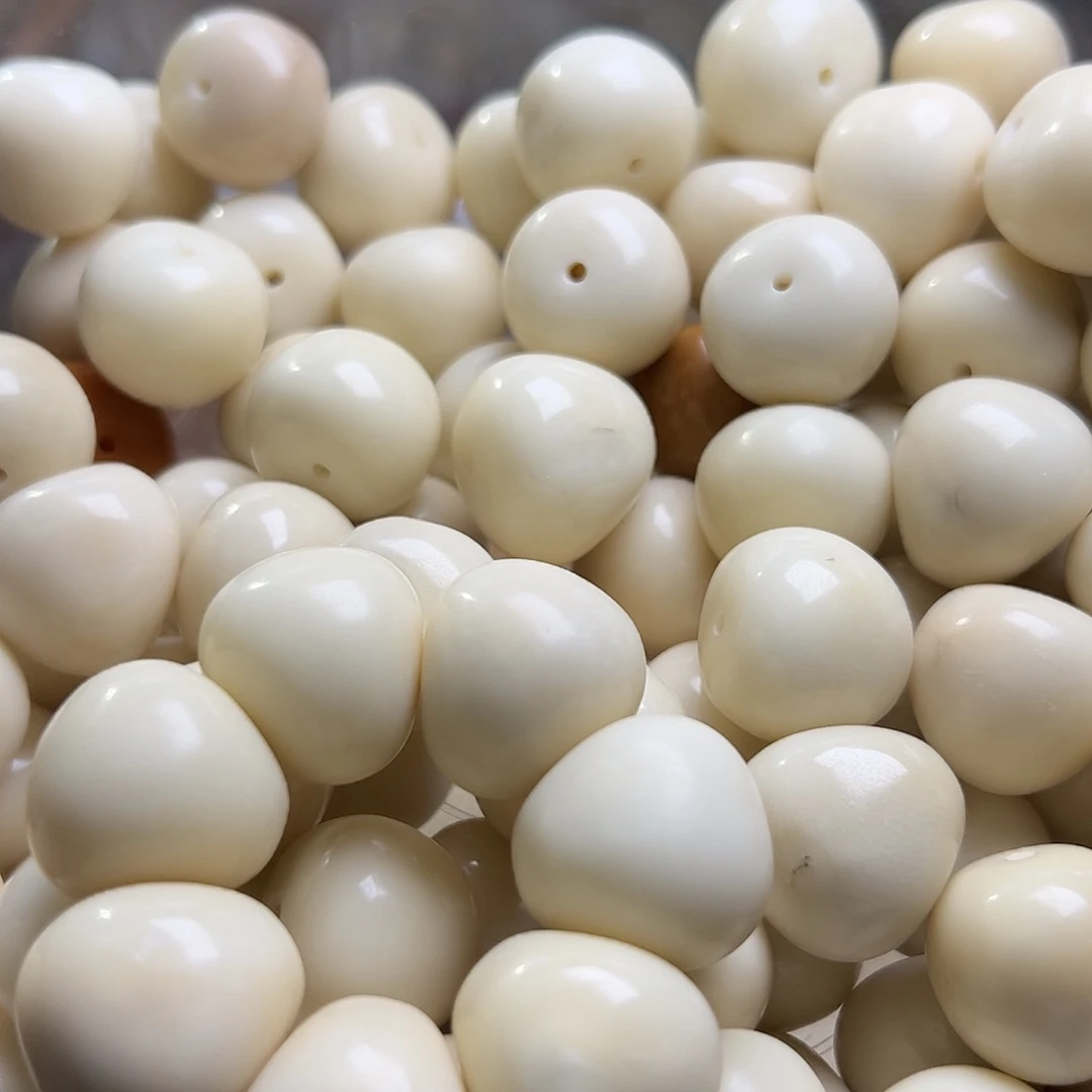 菩提根/象牙果吊坠四颗蒜瓣瑕疵表面或孔道有裂