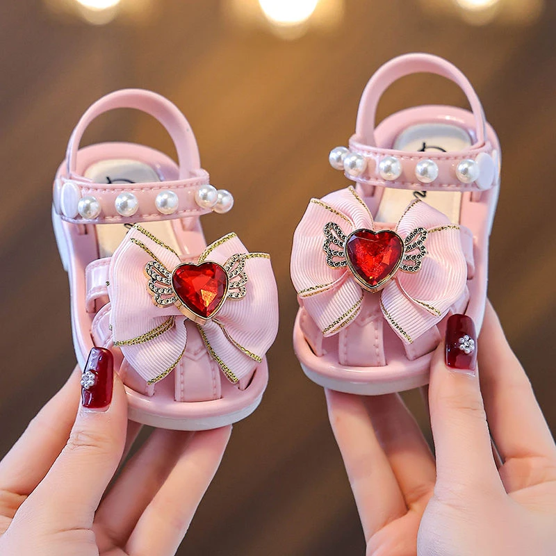 爱心蝴蝶结夏季防滑软底外穿公主可爱室内防滑沙滩宝宝包头凉鞋