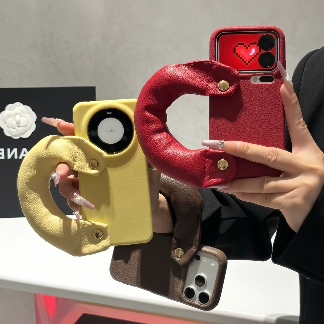 秋冬皮纹手腕带适用苹果17/16手机壳iPhone15小米14vivoppo华为潮