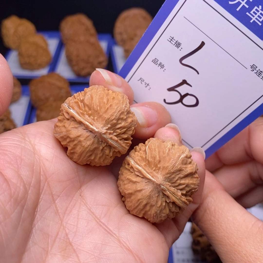 文玩核桃把件胡*郎手捻50