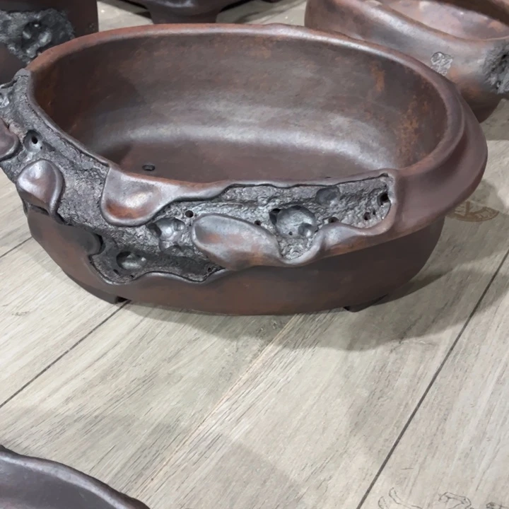 余***)紫砂花盆宜兴紫砂工艺厂。