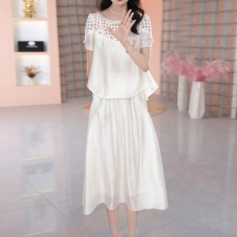 韩版宽松遮肉时尚套装2025夏季新款镂空蕾丝短袖上衣+A字裙两件套