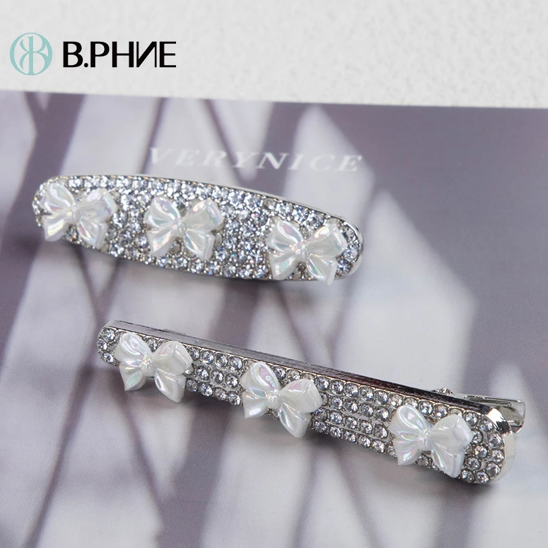 B.【贝菲】气质时尚长短满钻蝴蝶结压夹