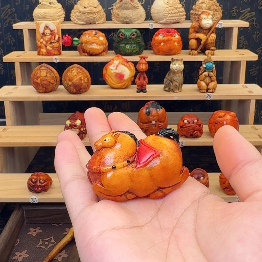 恩***斯香榧木鹿角糖马手把件福利