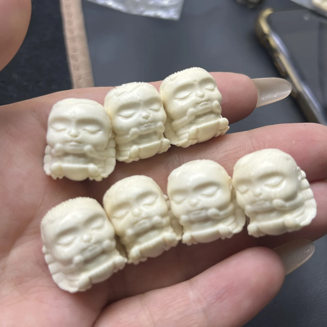 猛犸牙雕刻小天使配珠天地孔对孔20mm左右（微瑕）