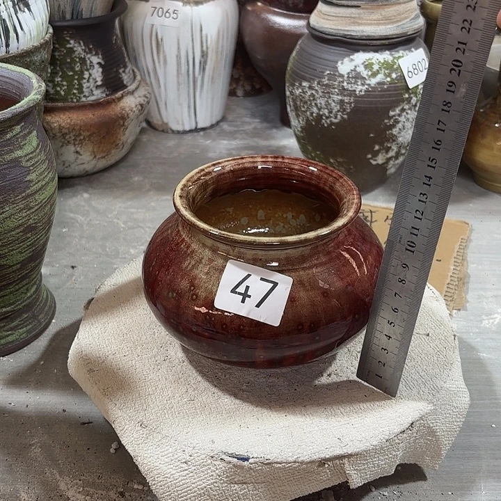 摆件陶高11，口9，有孔，47，