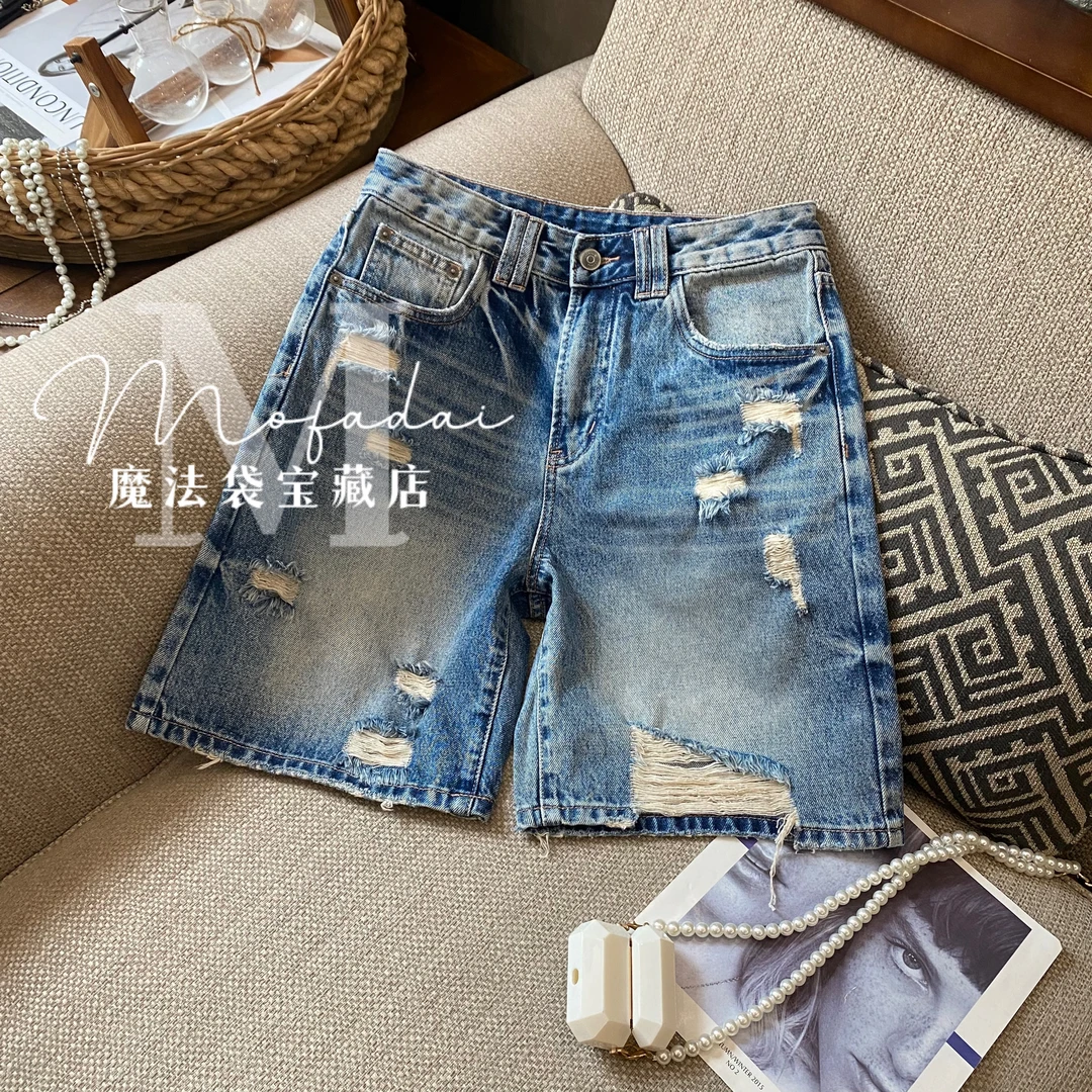 【魔法袋】蓝色无弹夏季款牛仔女裤面吊烂破洞后兜打磨设计五分裤
