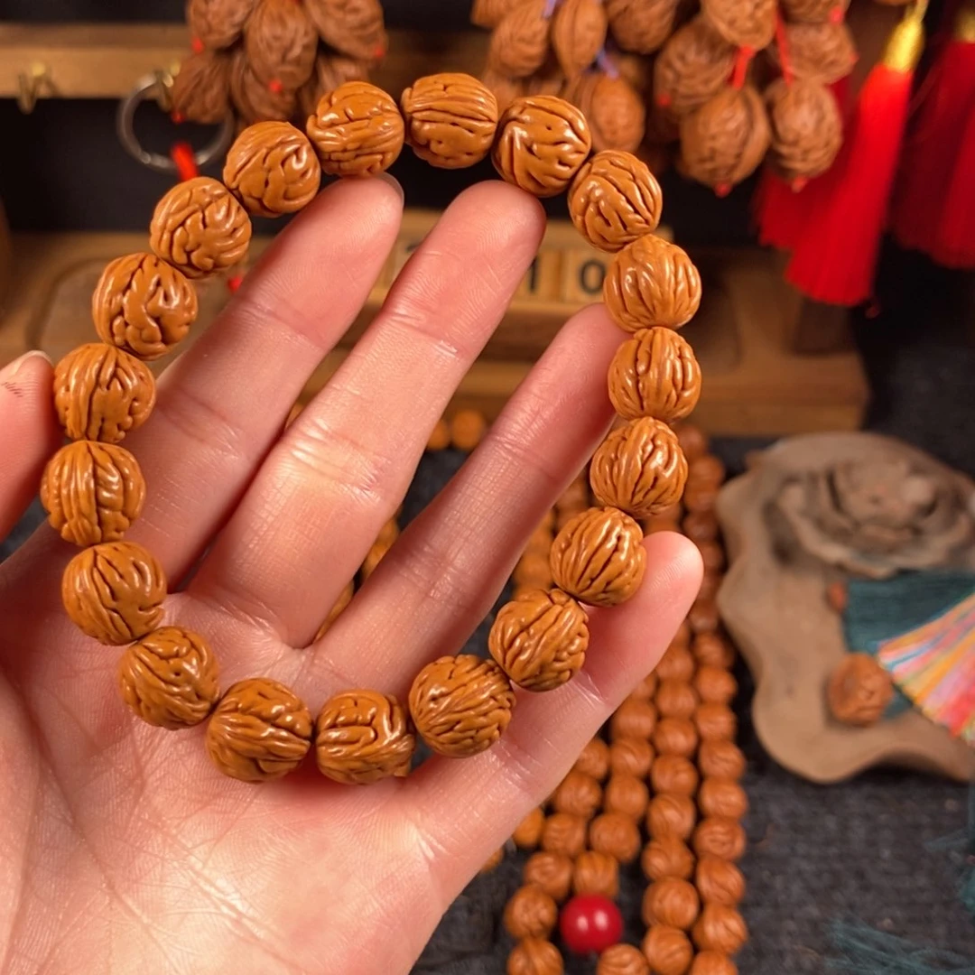 吊坠桃核桃枭手串