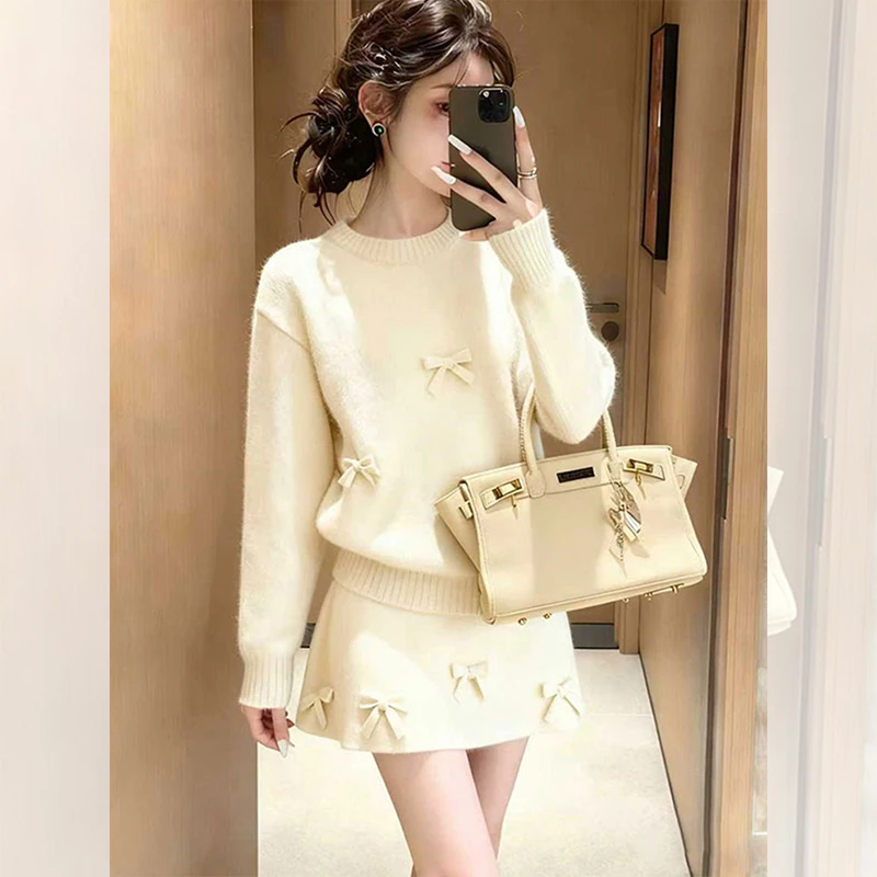 冬季炸街一整套女装洋气衣服穿搭白色蝴蝶结针织毛衣半身裙两件套