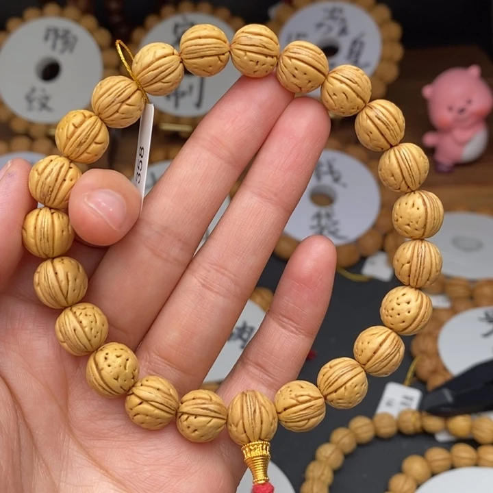 桃核手串金豆12宽……..