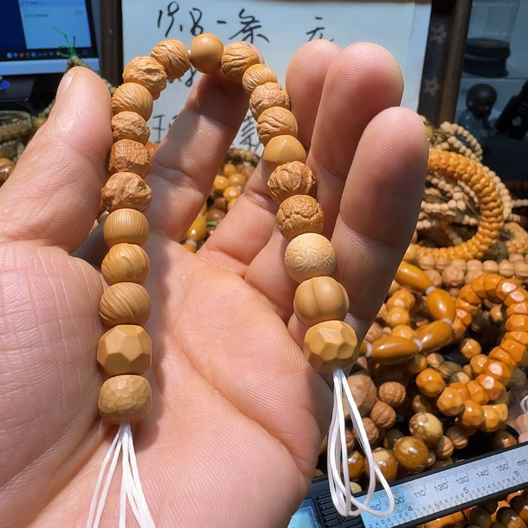 龙***人手串猴头核桃多宝