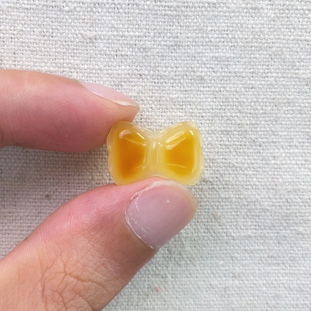 螺***白琥珀未镶嵌珠宝奇石蝴蝶结