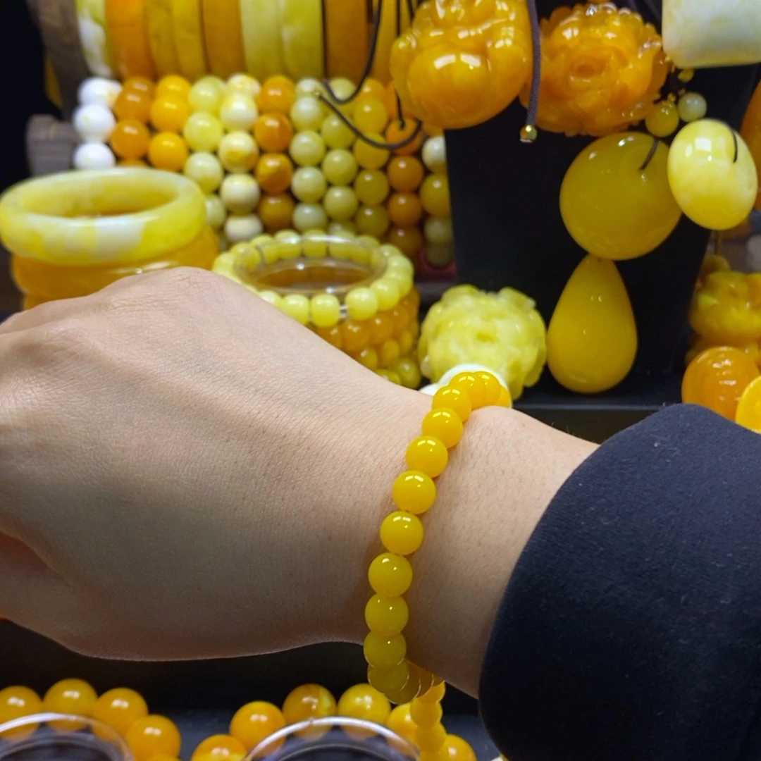 小***F非金属鸡油黄0.8手串