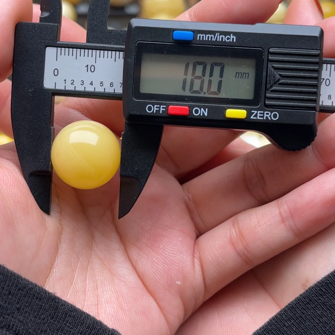 开***洋琥珀未镶嵌裸石蜜蜡圆珠笑