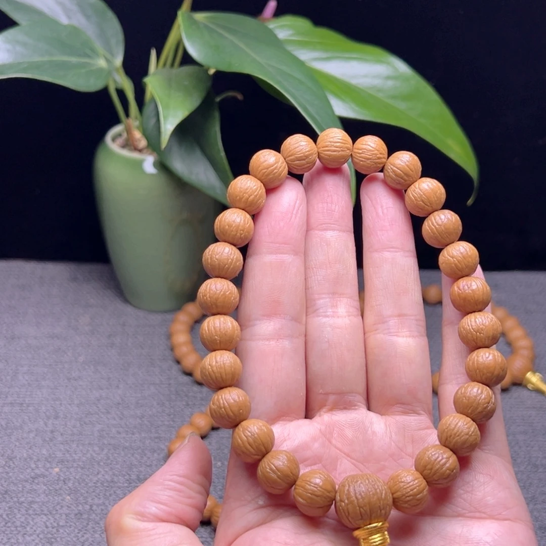 杰***情吊坠猴头核桃凤羽