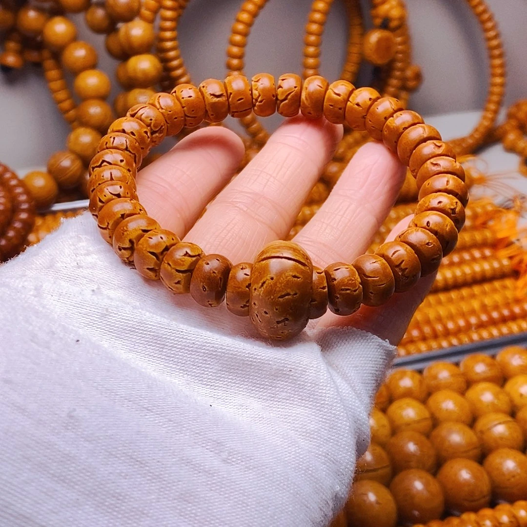 桃核吊坠6乘10核片手串微瑕39