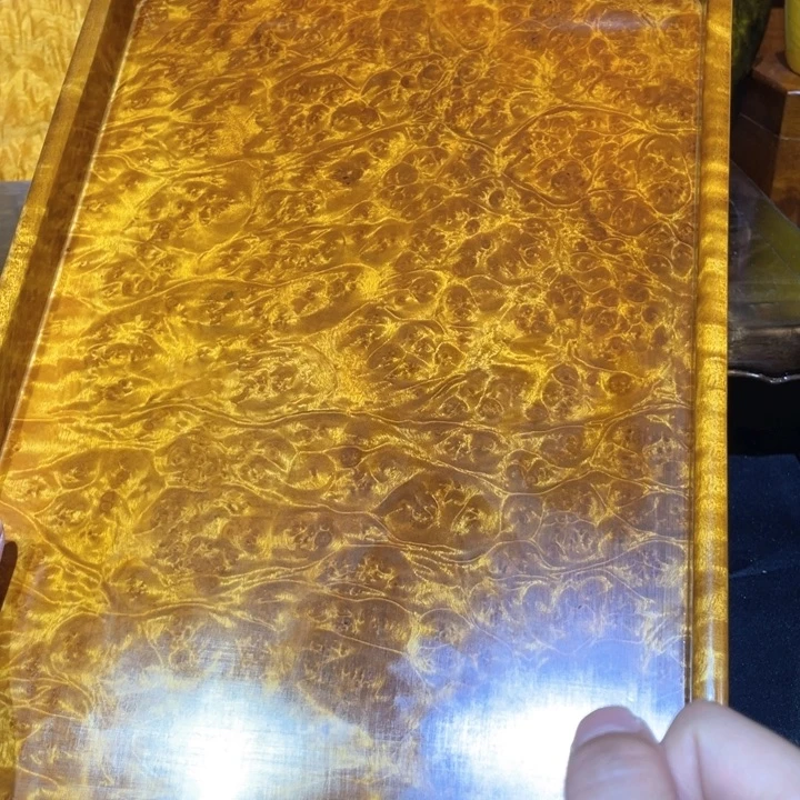 在***行金丝楠盘子4566556665556656666