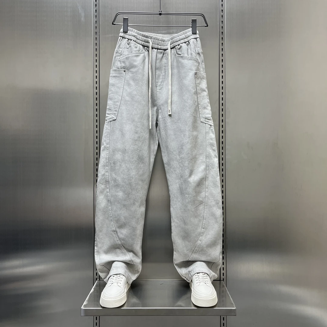 春夏款解构拼接慵懒风弯刀阔腿牛仔裤男潮牌痞帅休闲裤高街直筒裤