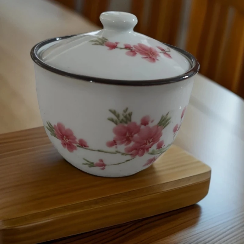 景德镇陶瓷水点桃花罐