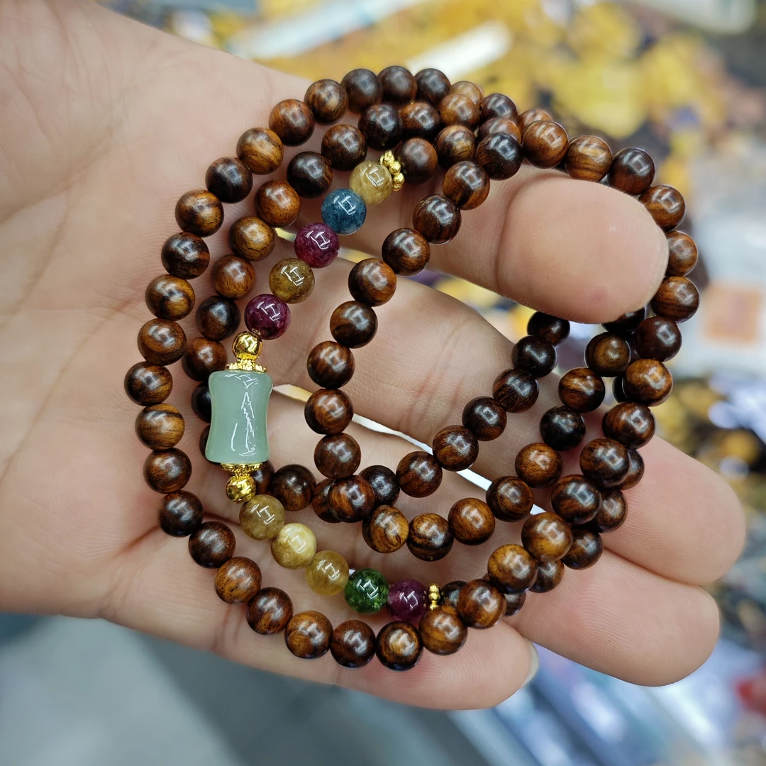 花梨木彩珠竹节四圈手串7772